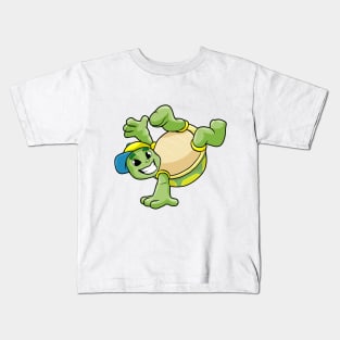Turtle as dancer at break dance with a cap Kids T-Shirt